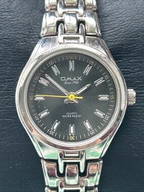 Omax Silver Tone Black Dial Women’s Quartz Watch